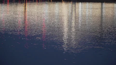 Lights reflecting on river Stock Footage 139984192