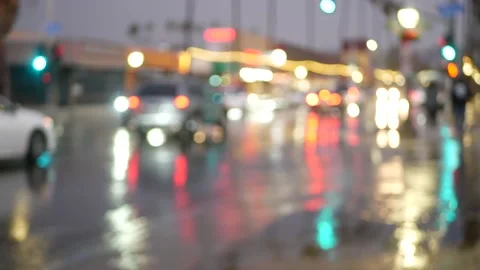 Lights reflection on road in rainy weather. Palm trees and rainfall, California. Stock Footage 200019565