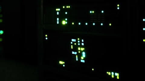Lights on a server rack inside a data center during nighttime operations Stock Footage 345003538
