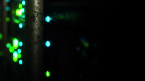 Lights show data activity in server room during evening hours Stock Footage 345003652