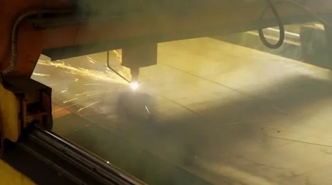 Lights of sparks on the plasma cutter while cutting a big metal sheet Stock Footage 64848035