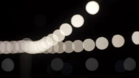 Lights String Bokeh with motion Stock Footage 233526365