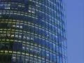 lights switch on corporate building glass facade skyscraper windows electricity Web Footage
