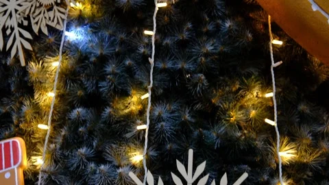 Lights on tree, wooden snowflake Stock Footage 328638301