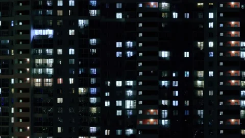 Lights of windows in many storied building, timelapse. Stock Footage 130855255