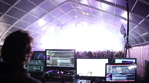 Lightshow @ Festival - Lighting engineer controls the show - Scene 2 Stock Footage 34136119