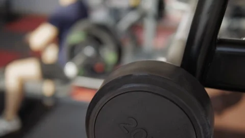 Lightweight barbells on rack Stock Footage 118074164