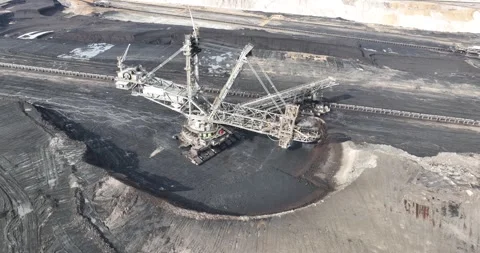 Lignite mine, large excavator in open pit mining bucket wheel excavator, large Stock Footage 257616769