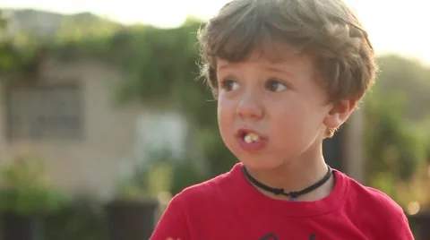 Liitle cute boy eating snack Stock Footage 42384874
