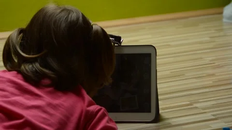 Liittle girl using tablet pc Stock Footage 41462123