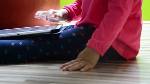 Liittle girl using tablet pc, closeup Stock Footage 41462149