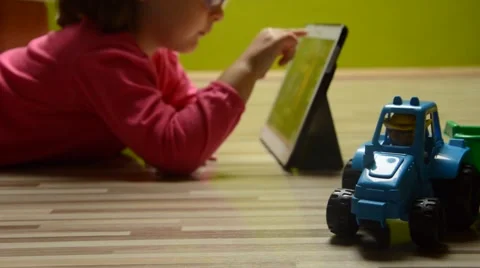 Liittle girl using tablet pc Stock Footage 41462182