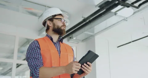 Likable concentrated confident experienced 35-aged bearded builder or contractor Video stock 145930391