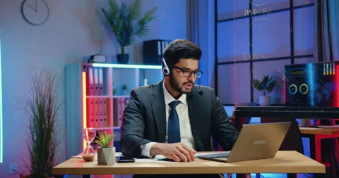 Likable confident experienced smart bearded businessman in suit wearing headset Stock Footage 166671915