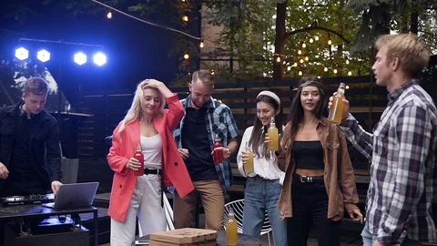 Likable joyful 30s mates having fun together in the cool party arranged in Stock Footage 116655565