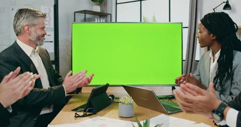 Likable positive confident qualified diverse business team sitting at company Stock Footage 160986597