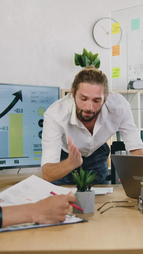 Likable raging bearded main office manager scolding his multicultural men-corpor Stock Footage 325389760