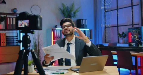 Likable smiling happy skilled bearded businessman recording video for business Stock Footage 166676669