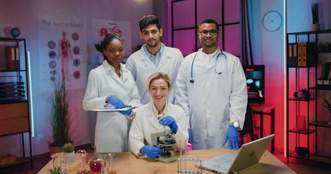 Likable smiling high-skilled smart diverse medical team of scientists in white Stock Footage 169180670