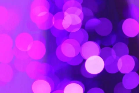 Lilac blurred lights Stock Photos