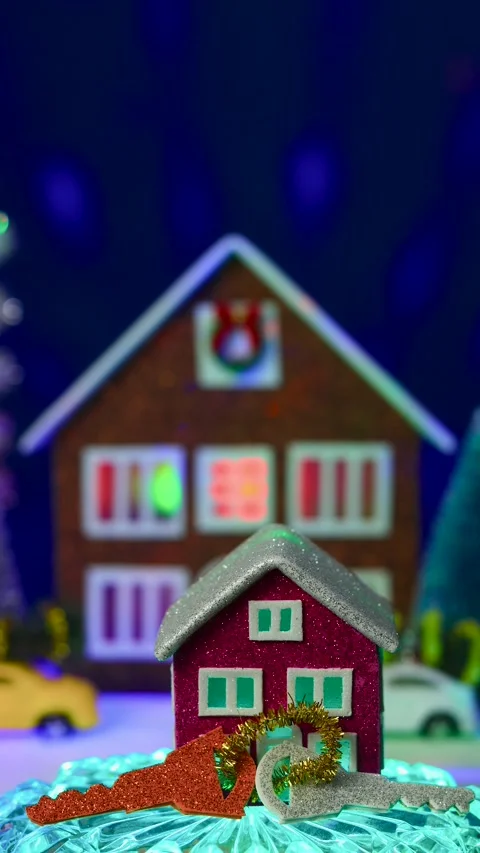 Lilac house with keys against the background of a large brown house Stock Footage 298964232