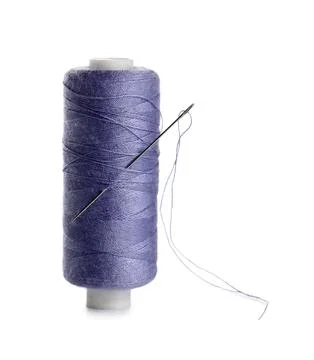 Lilac sewing thread with needle on white background Stock Photos