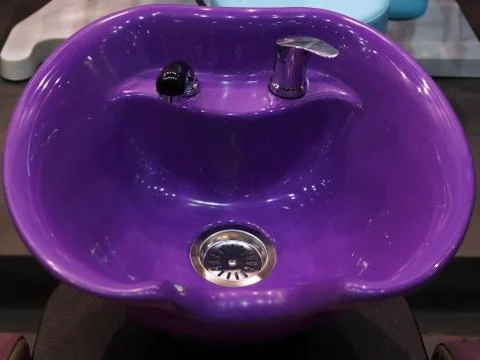 Lilac washbasin in the salon Stock Photos