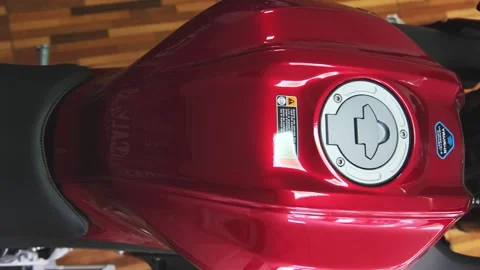 Lima, Peru, 15 Mar 2025. New color Red Yamaha R15v4 motorcycle, fuel tank cap Stock Footage 305263967