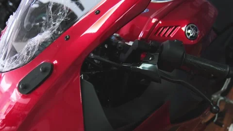 Lima, Peru, 15 Mar 2025. New color Red Yamaha R15v4 motorcycle detail showing Stock Footage 305264155