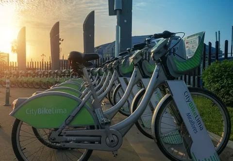 Lima, Peru, 2022. Users access the CitybikeLima rental APP at the Miraflores Stock Photos