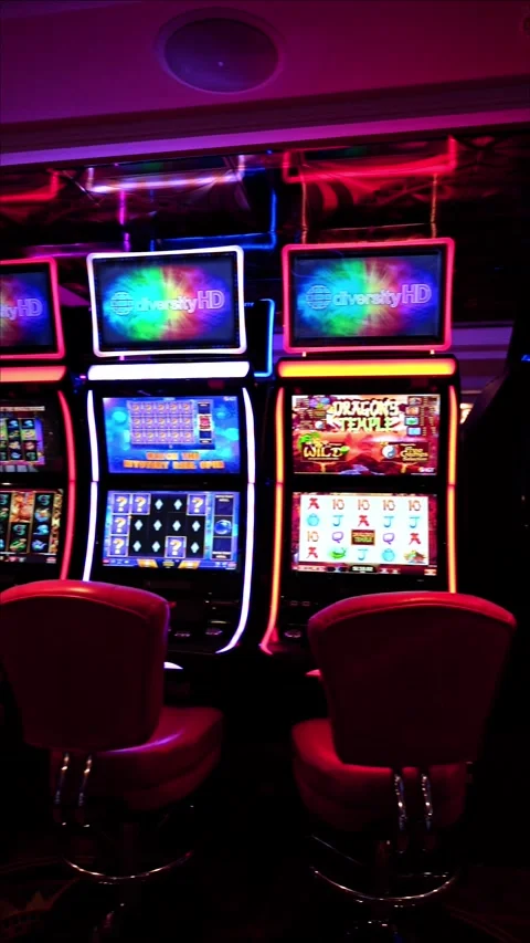 Lima, Peru, March 04, 2026: Row of slot machines with neon lights in casino 库存影片 332511230