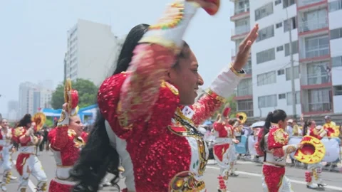 Lima, Peru. March, 1 2026; Peruvian caporales dancers performing in andean Stock Footage 330255427