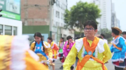 Lima, Peru. March, 1 2026; Dancers participating andean carnival parade in lima Stock Footage 330255461