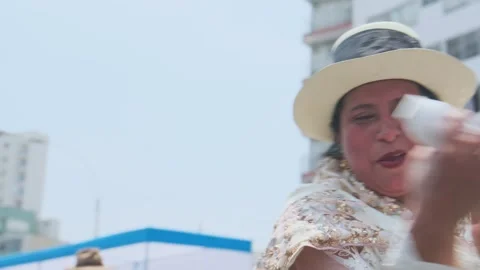 Lima, Peru. March, 1 2026; Peruvian women dancing in an andean carnival parade Stock Footage 330255558