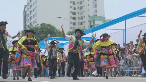 Lima, Peru. March, 1 2026; Peruvian dancers in colorful traditional costumes at Stock Footage 330255646