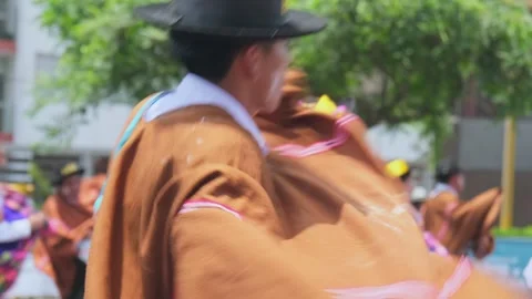 Lima, Peru. March, 1 2026; Traditional peruvian dancers at andean carnival Stock Footage 330255700