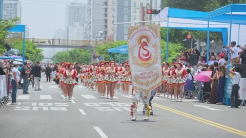 Lima, Peru. March, 1 2026; Caporales dancers performing during andean carnival Stock Footage 330255735