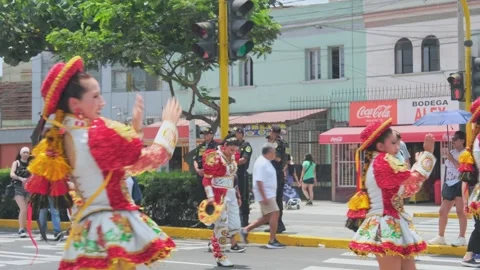 Lima, Peru. March, 1 2026; Traditional peruvian dancers at andean carnival Stock Footage 330256096