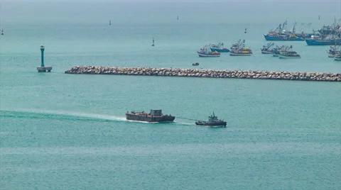Lima Peru Port Boat Pulling Barge at Harbor Entrance Stock Footage 61093991