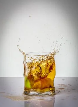 Lime and drink splash Stock Photos