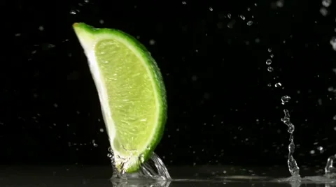 Lime and water splash, Slow Motion Stock Footage 10700525