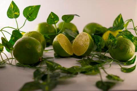 Lime in basket Stock Photos