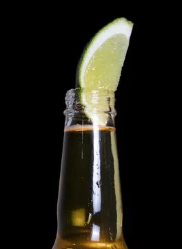Lime in Beer Bottle Stock Photos