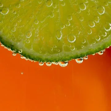 Lime in the bubbles Stock Photos