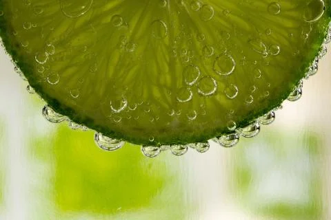 Lime in the bubbles Stock Photos