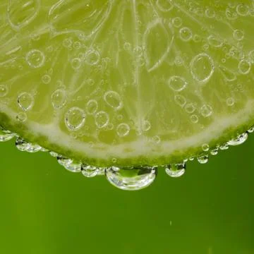 Lime in the bubbles Stock Photos