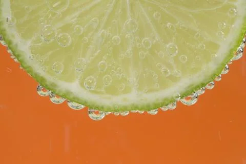 Lime in the bubbles Stock Photos
