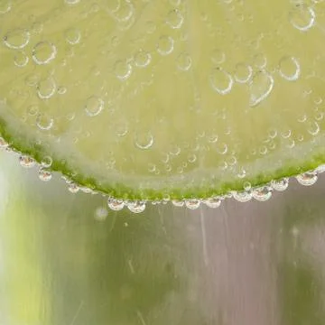 Lime in the bubbles Stock Photos