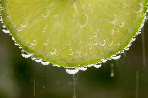 Lime in the bubbles Stock Photos
