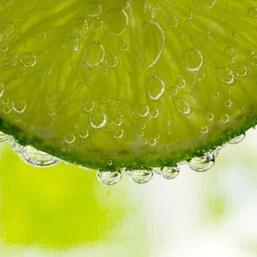 Lime in the bubbles Stock Photos
